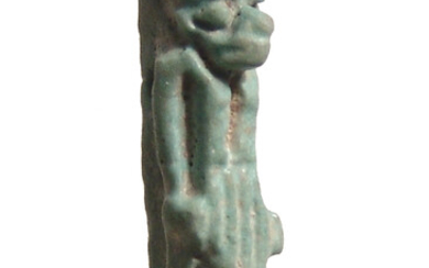 An attractive Egyptian faience amulet of Anubis