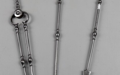 An early 19th century set of three polished steel fire irons