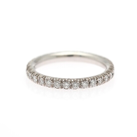 An eternity diamond ring set with numerous brilliant-cut diamond weighing a total of app. 0.54 ct., mounted in 18k white gold. Size 52.