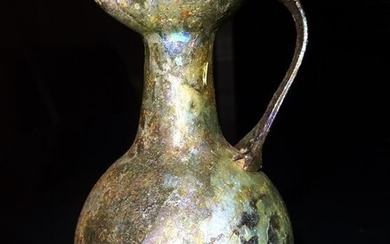 Ancient Roman Glass Roman oenochoe in strongly iridescent glass - 1st / 2nd C. appraised by Antoine TARENTINO