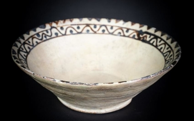 Arte Islamica A Samanid slip painted pottery bowl