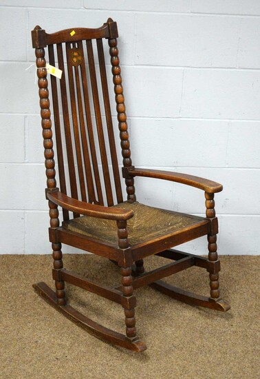 Arts & Crafts oak rocking chair.