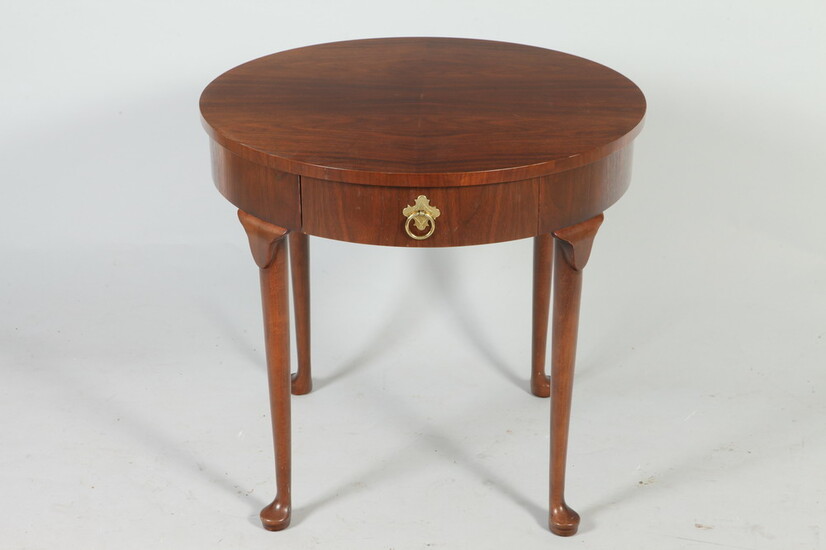 BAKER CO. QUEEN ANNE STYLE MAHOGANY CIRCULAR-TOP SIDE TABLE. One...