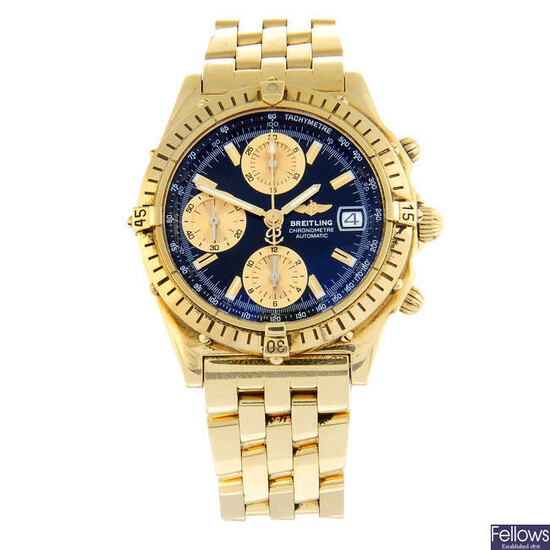 BREITLING - an 18ct yellow gold Chronomat chronograph bracelet watch, 39mm.