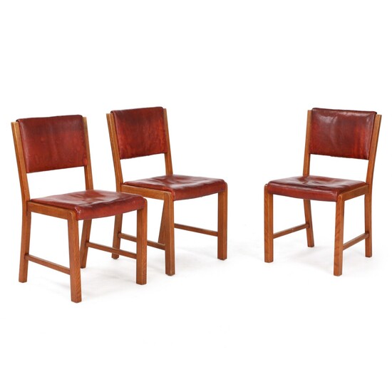 NOT SOLD. Bodil Gøtzsche: Set of three dining chairs with patinated oak frame. Upholstered with...