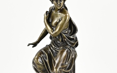Bronze figure. 20th century. Lady in robe sitting on pedestal, with black marble base. Chip...