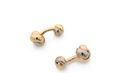 CARTIER, Paris Pair of cufflinks with decoration of trimmings in 18K yellow, grey and pink gold