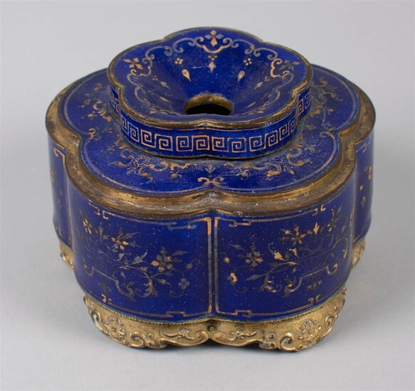 CHINESE ROYAL BLUE ENAMEL AND GILT DECORATED PRUNUS-FORM INK POT, QIANLONG FOUR-CHARACTER SEAL MARK IN BLUE UNDER BASE