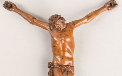 CHRIST en buis sculpté, pieds juxtaposés, périzonium noué à droite. Epoque XVIIIème siècle. Accidents (notamment...