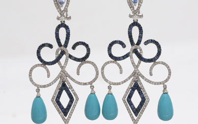 Chandelier earrings in diamonds, sapphires, tanzanites and turquoises.