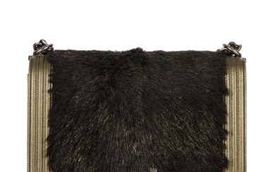 Chanel, a New Medium Boy bag, featuring a black faux fur fro...
