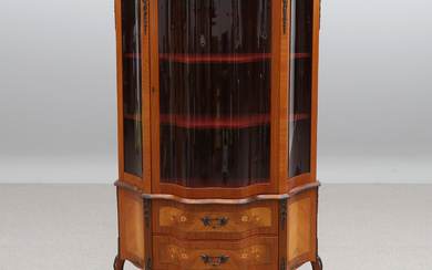 DISPLAY CABINETS. Mahogany with intarsia decor and brass fittings. Louis XVI style, second half of the 20th century.