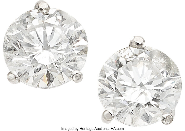 Diamond, White Gold Earrings Stones: Round brilliant-cut diamonds weighing...