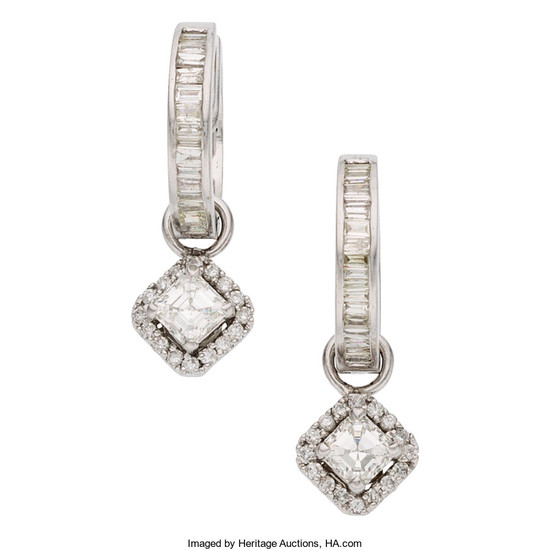 Diamond, White Gold Earrings The hoop earrings feature baguette-cut...