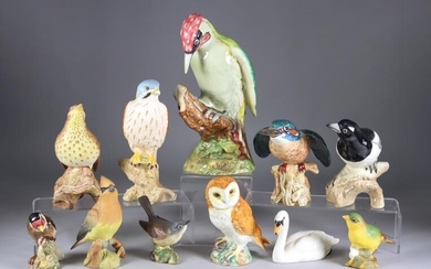Eleven Beswick Pottery Bird Models, including - green woodpecker,...