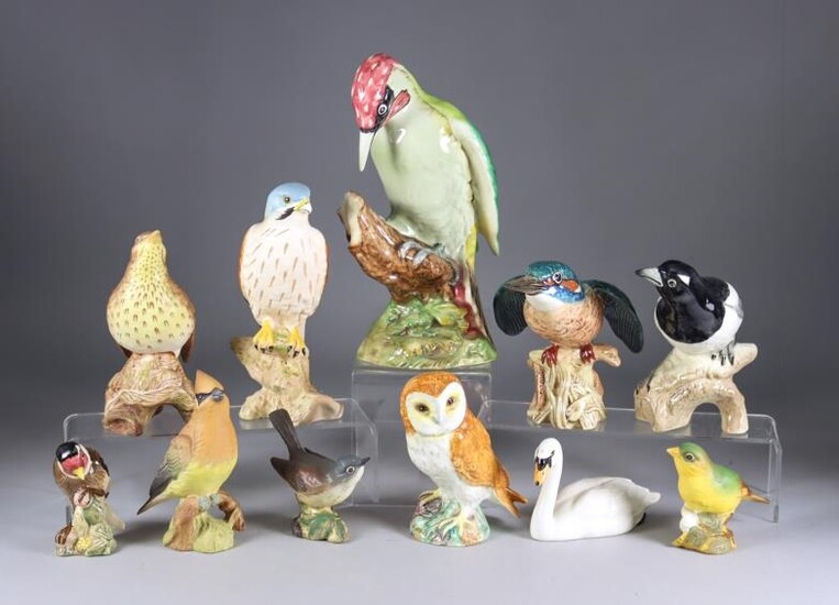 Eleven Beswick Pottery Bird Models, including - green woodpecker,...