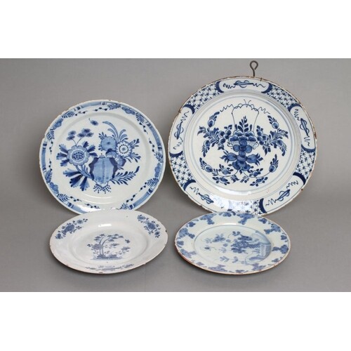 FOUR DUTCH DELFT PLATES, late 18th and 19th century, all pai...