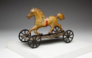 GEORGE W. BROWN & CO. PRESSED TIN HORSE PULL TOY.