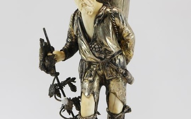 *German bone-mounted silver figure of a traveler