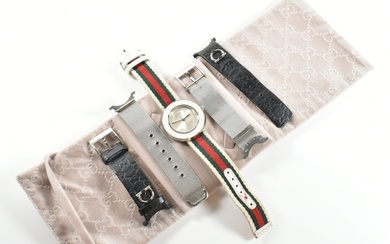 Gucci U-Play wrist watch. The wrist watch having silver face...