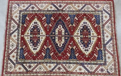 INDIA KAZAK : Wool carpet with three blue...