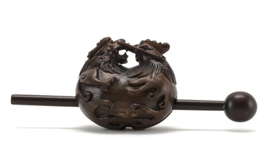 JAPANESE WOOD MOKUGYO BELL In the form of a conjoined rooster and dragon on waves. Length 2".