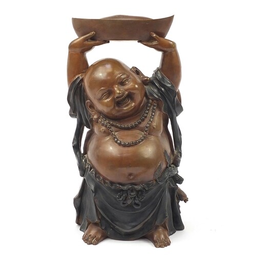 Large Chinese patinated bronze figure of Buddha with his han...