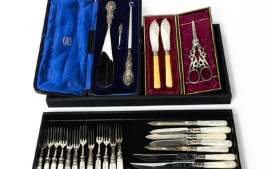 Lot of silver flatware, comprising a cased three piece sterling handle dresser set, two piece and JD