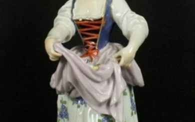 Meissen Figure Of Woman Holding Dress