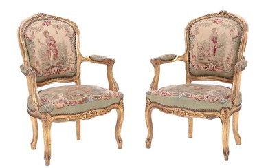 PAIR LOUIS XV STYLE CARVED AND GILT WOOD OPEN ARM...