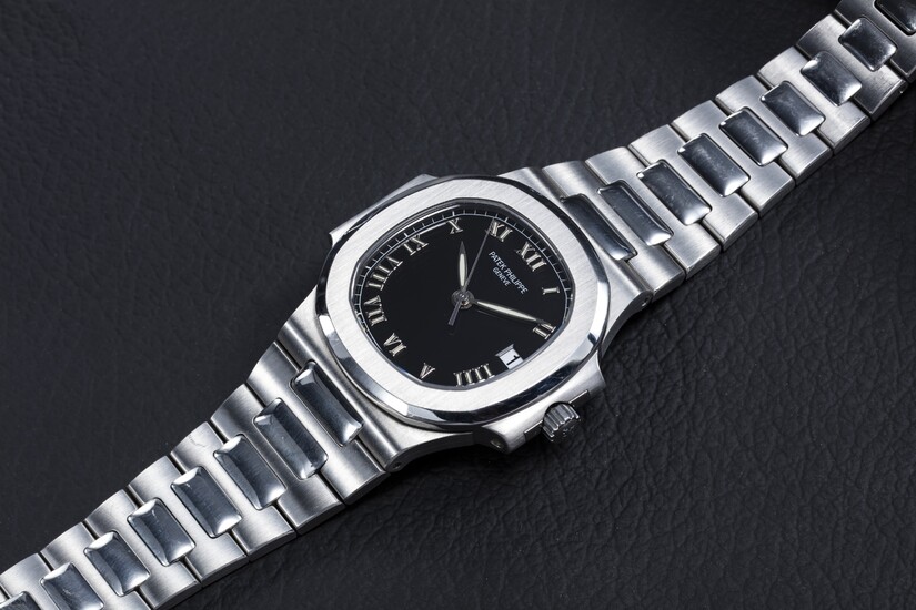 PATEK PHILIPPE, REF. 3800/1A-001, A STEEL NAUTILUS WITH BLACK DIAL AND ROMAN NUMERALS