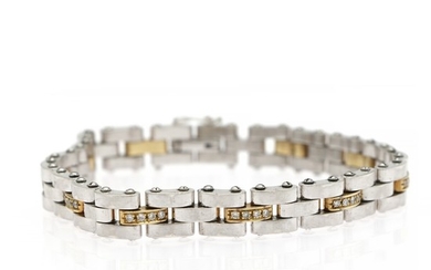 PLAZA: A “Dimension” diamond bracelet set with numerous brilliant-cut diamonds, mounted in 18k gold and white gold. L. 19 cm.