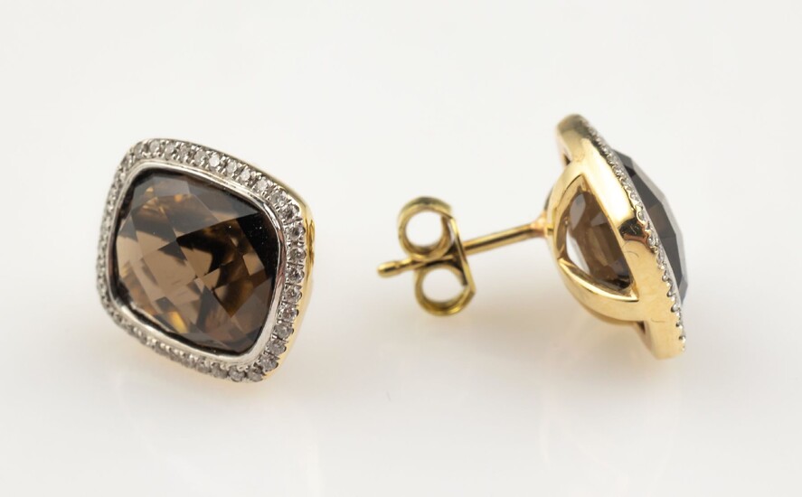 Pair of 14 kt gold earrings with diamonds...