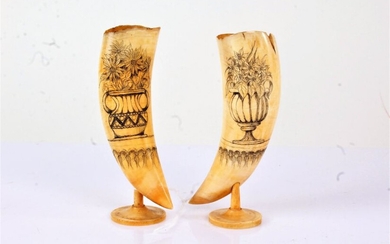 Pair of 19th century scrimshaw whales teeth, the engraved pen work decoration with urns blooming