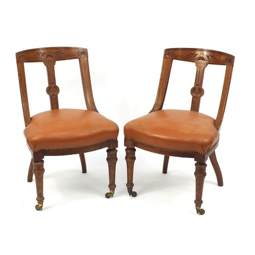 Pair of Victorian oak chairs with brown leather seats, 85cm ...