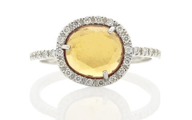 Pomellato: White Gold, Garnet and Diamond Halo Ring