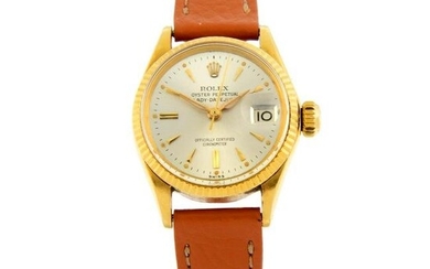ROLEX - an Oyster Perpetual Lady-Datejust wrist watch. Circa 1963. 18ct yellow gold case with fluted