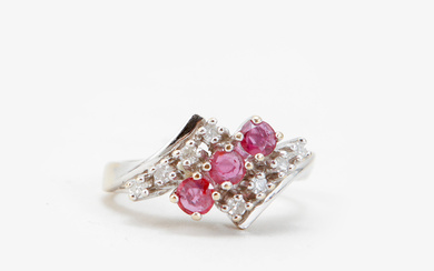 Ring,18K white gold, 8 diamonds, 3 rubies, weight approx 3,7 g.