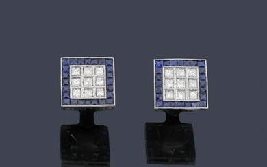 Short earrings in platinum with a square princess-cut