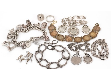 Silver jewellery including a charm bracelet with a collectio...