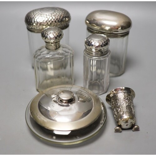 Six assorted silver mounted glass toilet jars, including a p...
