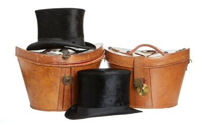 TWO BLACK SILK TOP HATS IN THEIR ORIGINAL LEATHER HAT BOXES