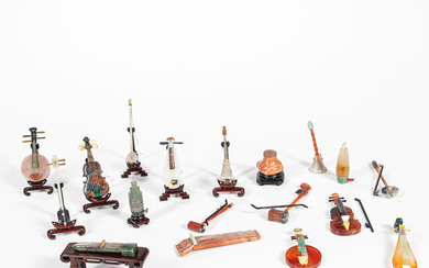 Twenty Miniature Stone Carvings of Musical Instruments
