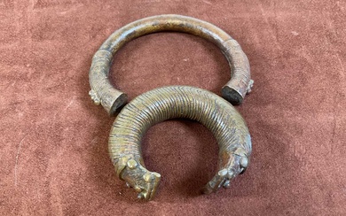 Two bronze Manilla slave trading bangles.Condition Report There is no...
