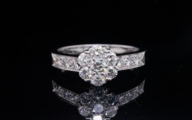 Van Cleef & Arpels 0.65ctw Diamond and 18K Fleurette Ring