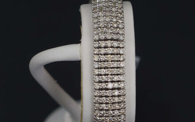 White gold bracelet with 445 natural diamonds 20th century. Brilliant - 445 pieces - 10.7 ct .; cut - round, diamond; 1.8-1.9 mm; purity - SI-I1; color - almost colorless (HJ range); sanding quality, polish and symmetry - good. Weight 27.82 grams...