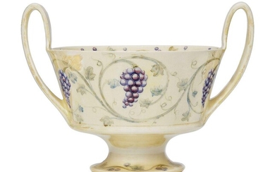 William Moorcroft (1872-1945), a Grape pattern twin-handled ceramic lustre bowl...