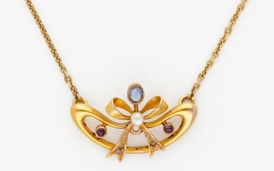 Yellow gold anchor link necklace with a yellow gold tooled...