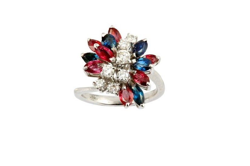 A sapphire, ruby and diamond ring. diamonds approx.