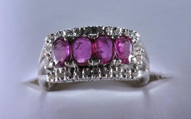 14k white gold, diamond, and ruby ring. Contains four